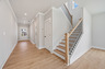 foyer with hard surface flooring & staircase