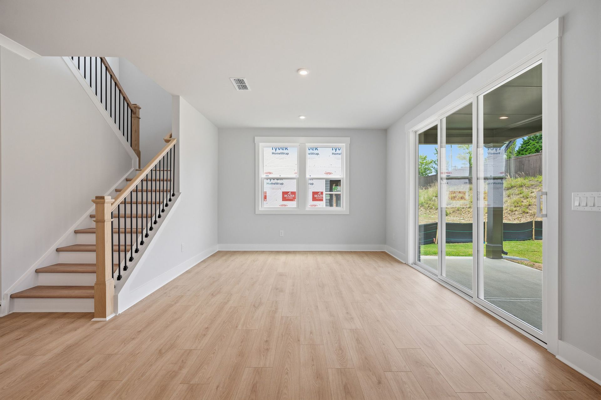 dining room with hard surface flooring and windows