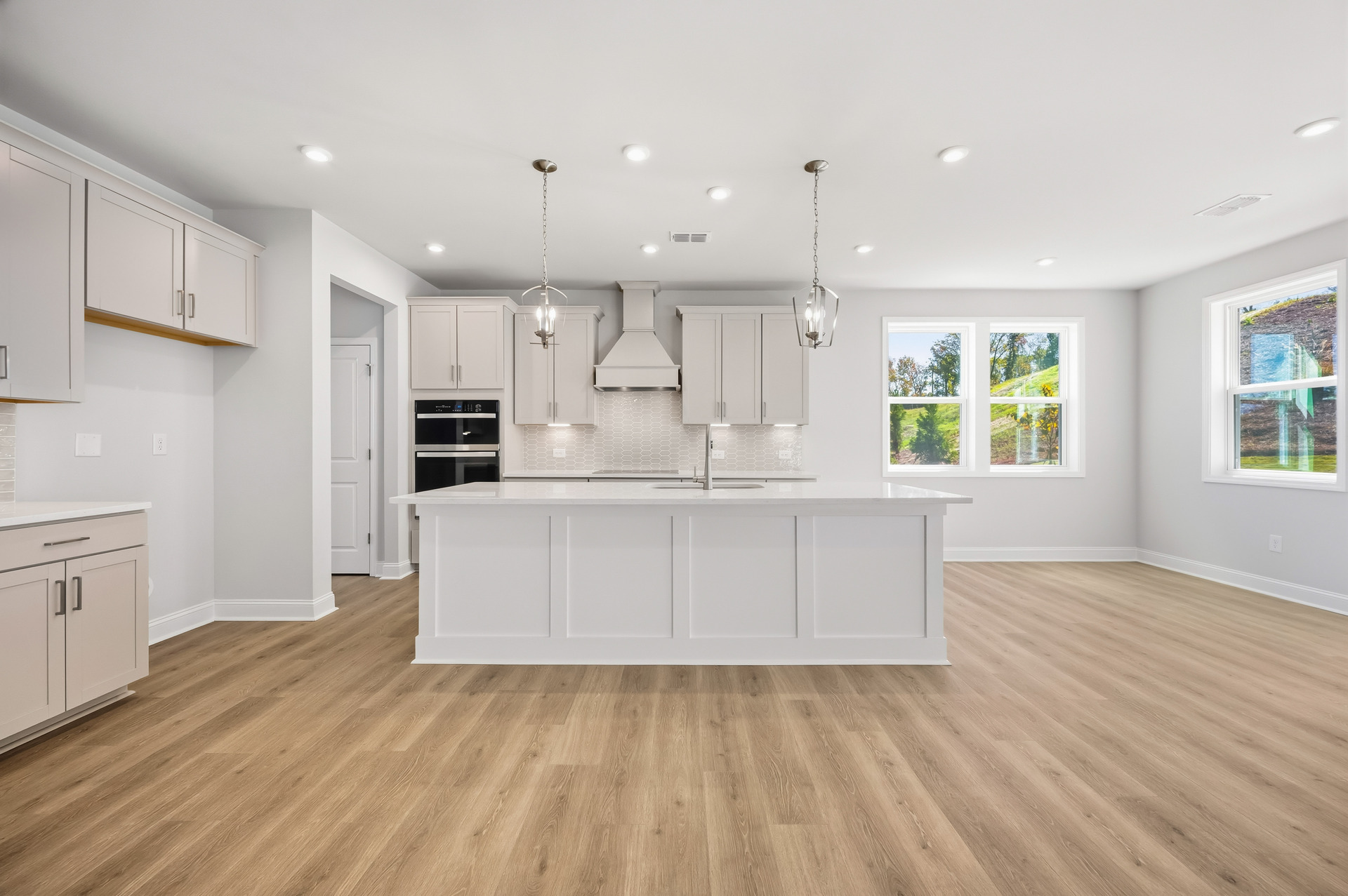 kitchen with center island connected to the breakfast room