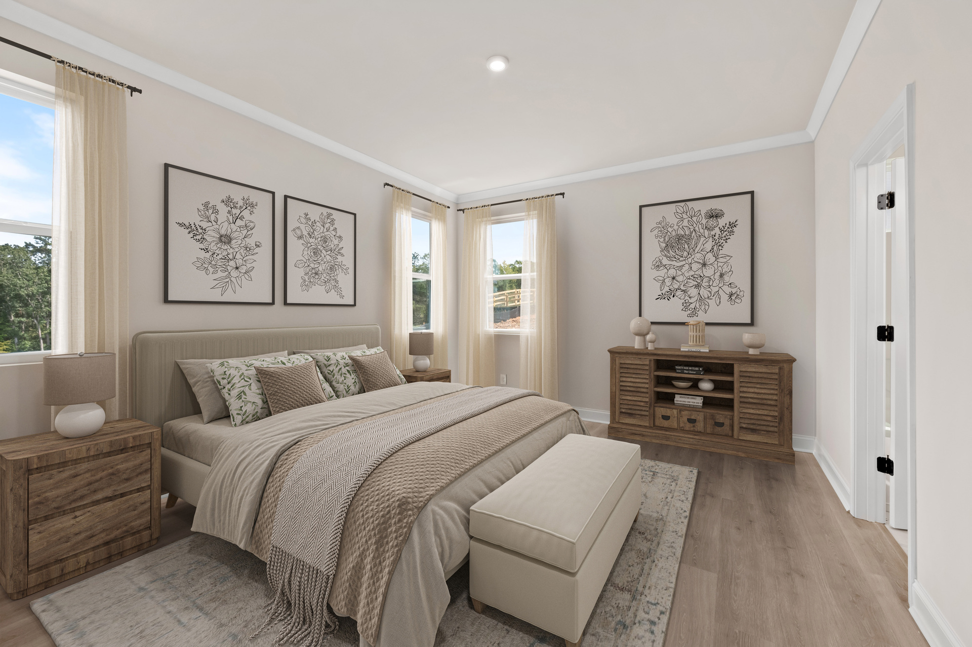 primary bedroom with king bed and en-suite bathroom