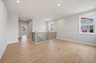 loft with hard surface flooring and windows