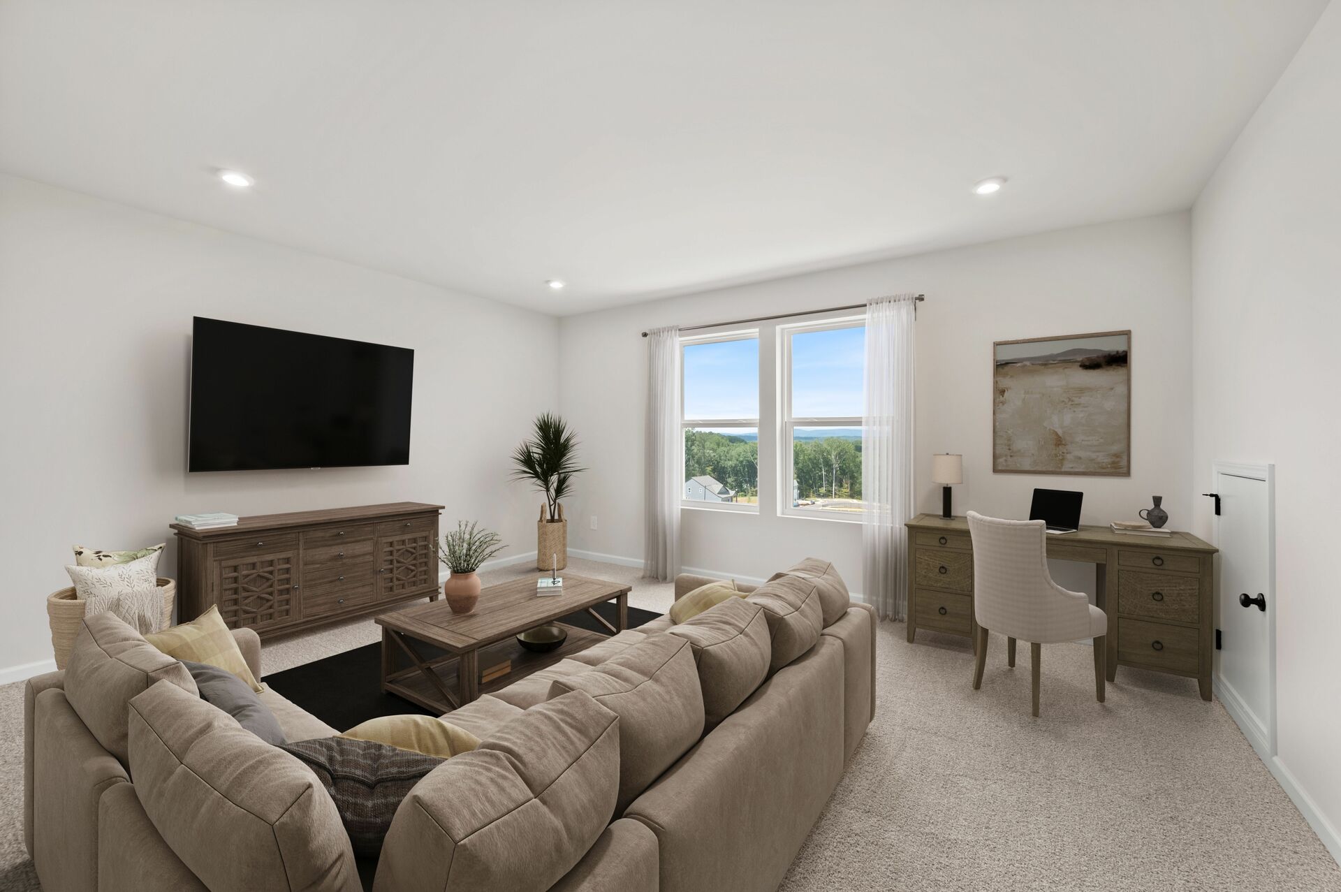 loft with media room and windows