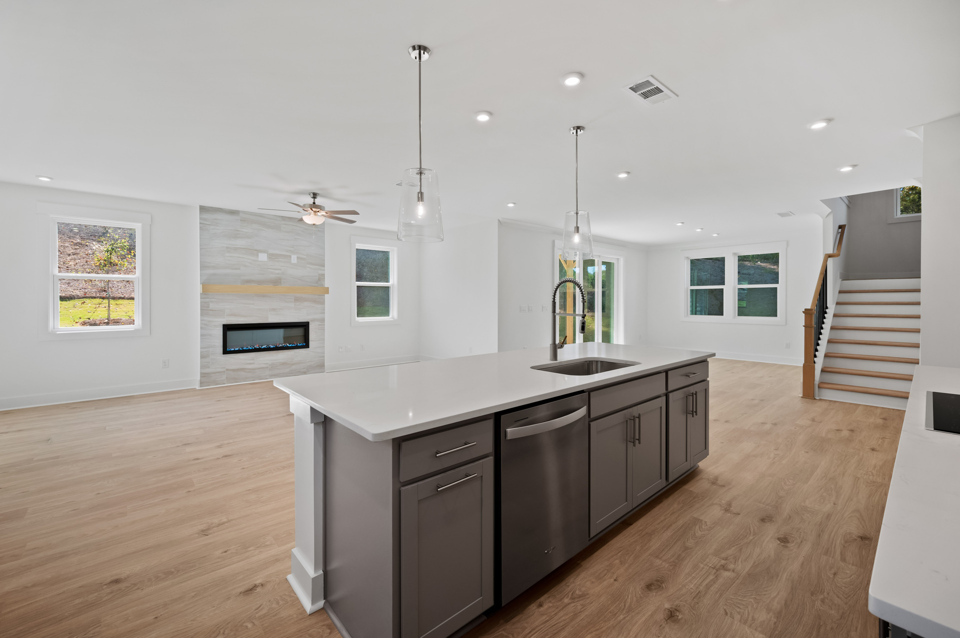 kitchen with gray cabinets and a center island
