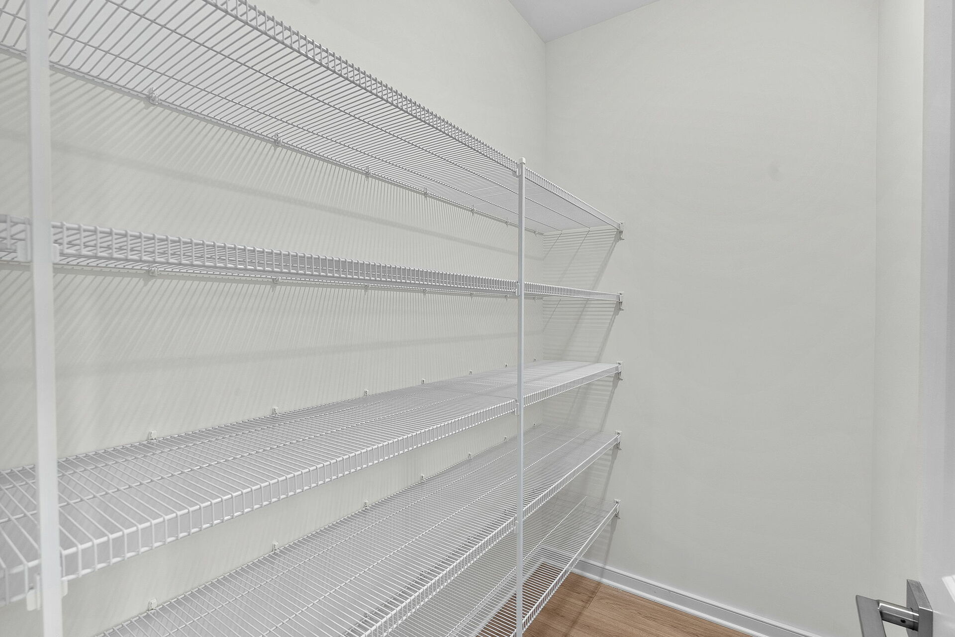 walk in pantry with wire shelves