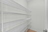 walk in pantry with wire shelves