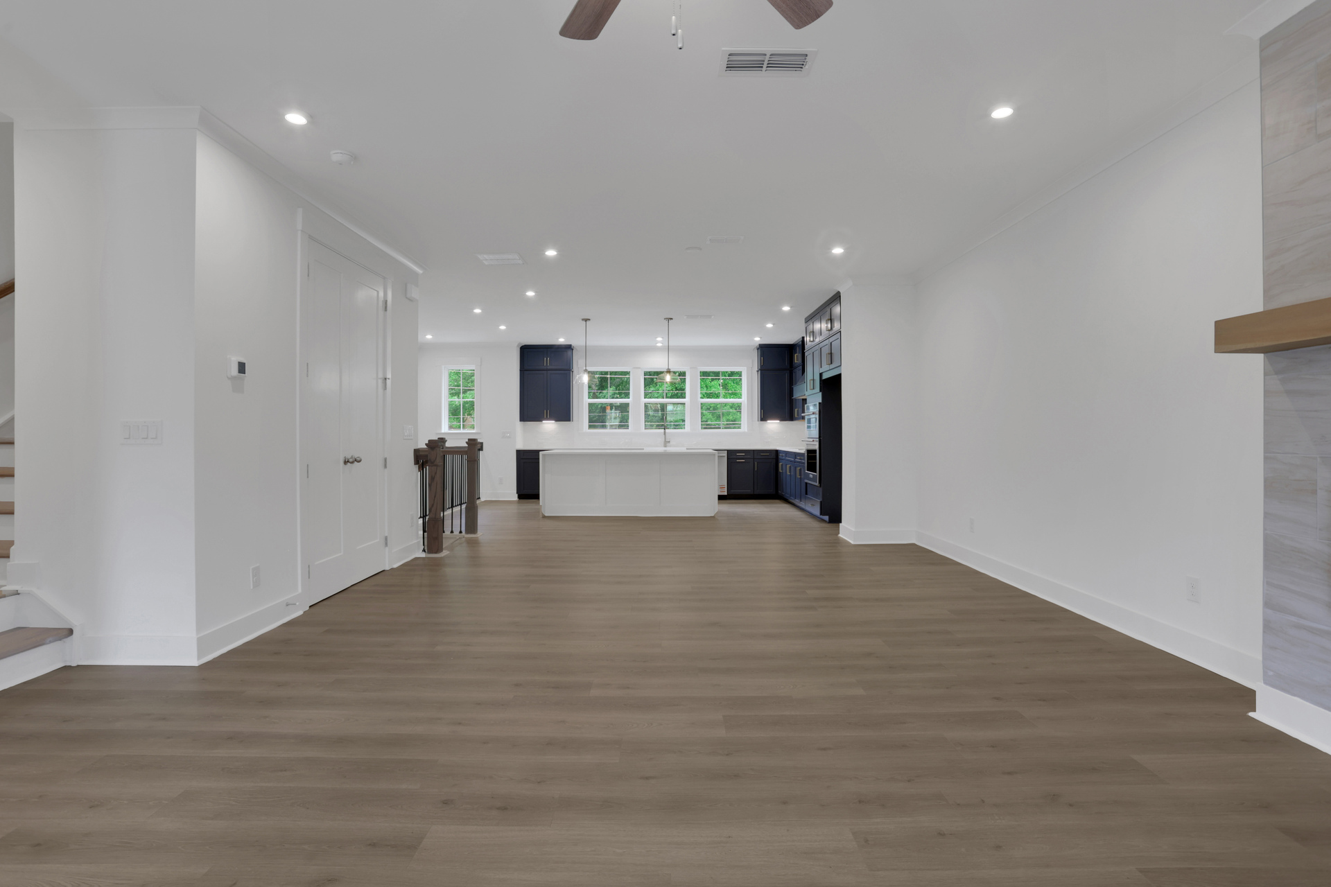 dining room with hard surface flooring and open to the kitchen 