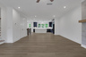 dining room with hard surface flooring and open to the kitchen 