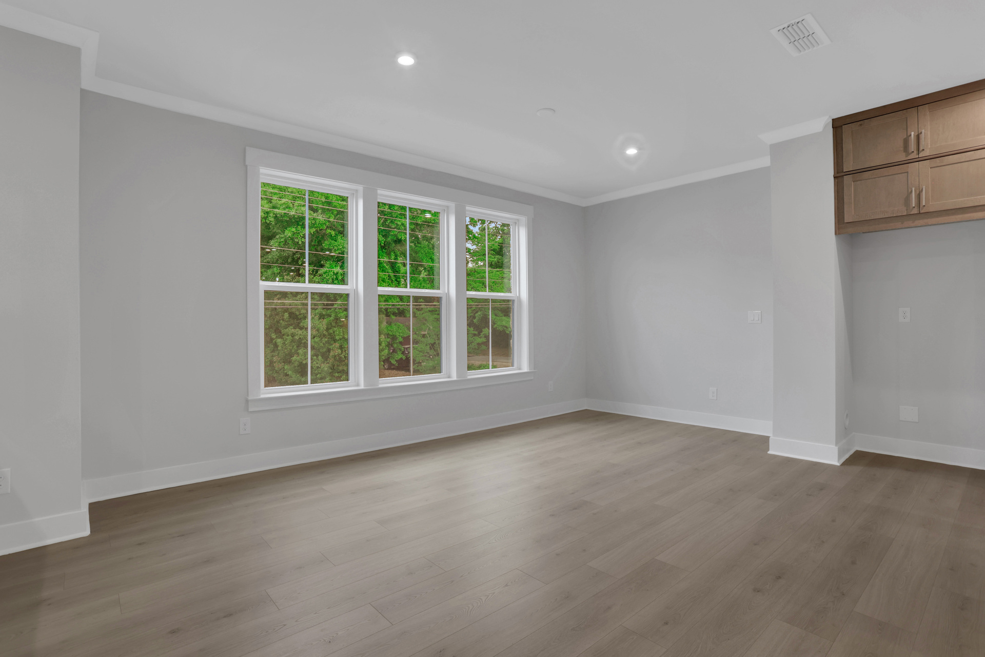dining room with hard surface flooring and windows