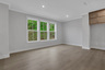 dining room with hard surface flooring and windows