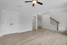 recreation room with hard surface flooring and en-suite bath