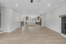 dining room with hard surface flooring open to the kitchen and great room
