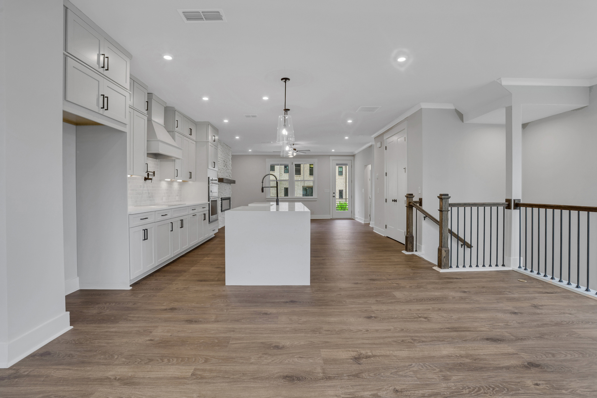 kitchen with white cabinets and quartz counters