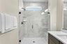 frameless walk in shower with black hardware