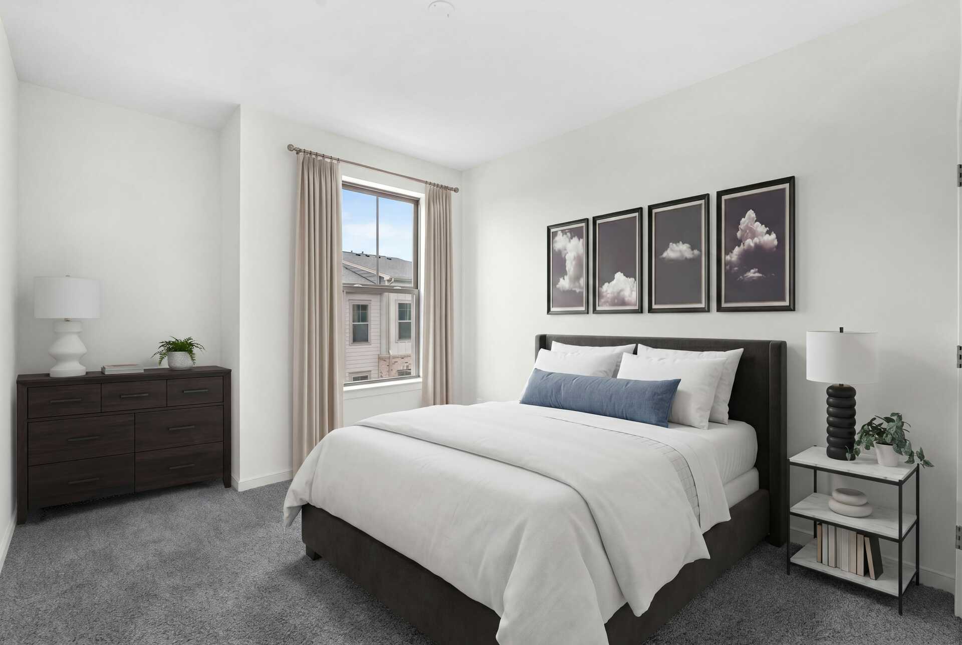 carpet with queen bedroom and drawers