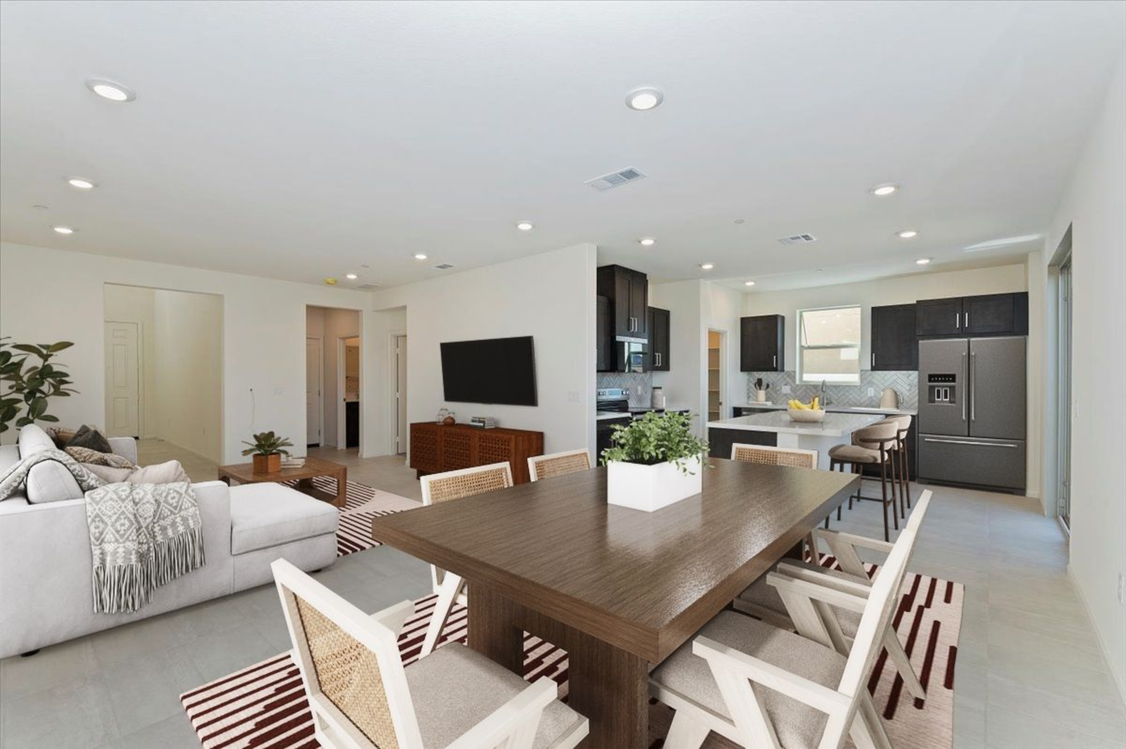 dining room featuring a brown dining table with 6 white dining chairs