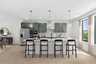kitchen island with chairs and pendant lighting