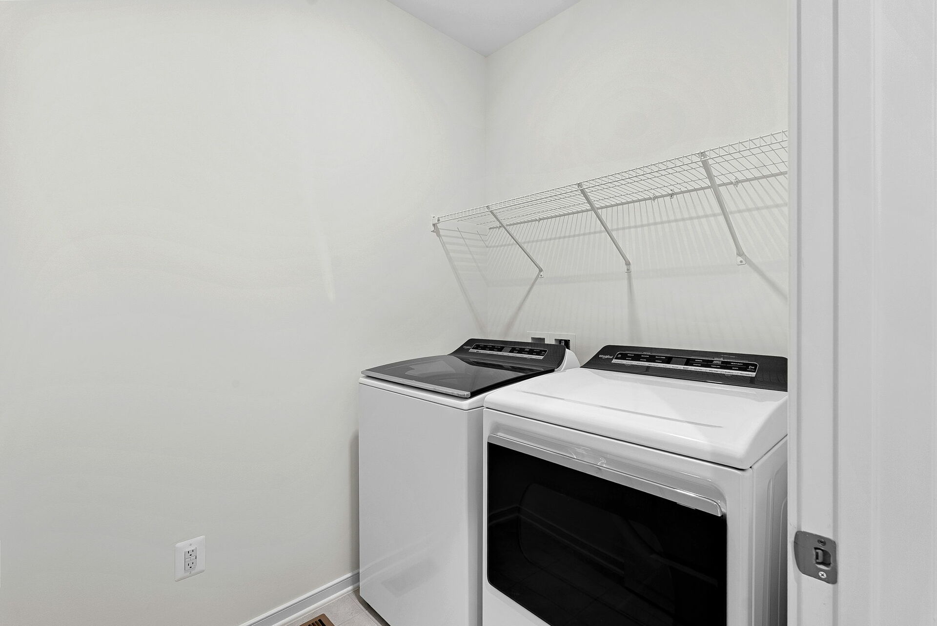 laundry with washer and dryers