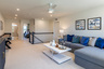 loft with a sectional couch