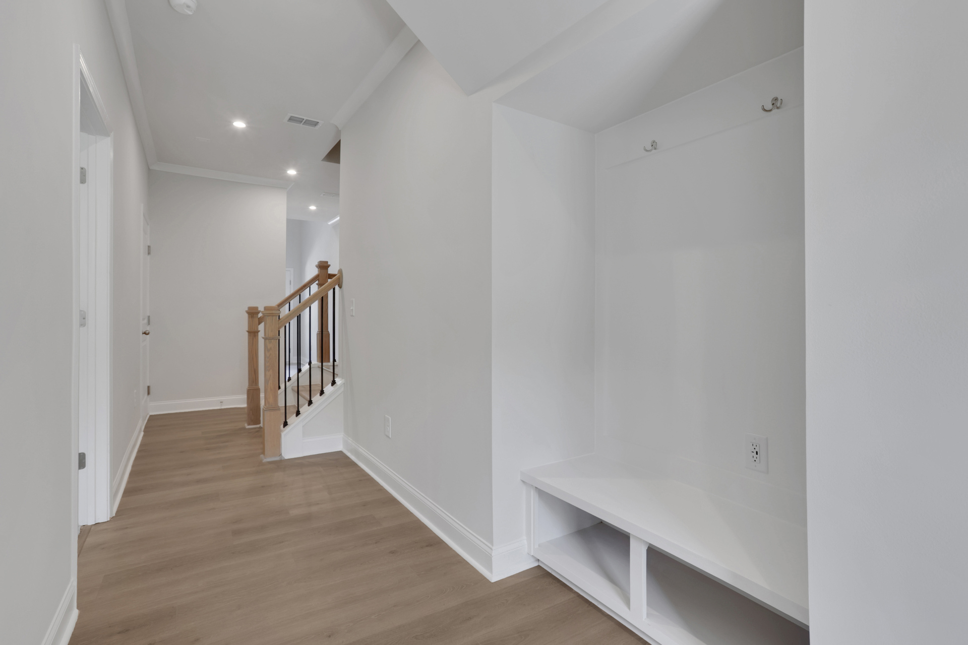 mudroom with hard surface flooring and valet