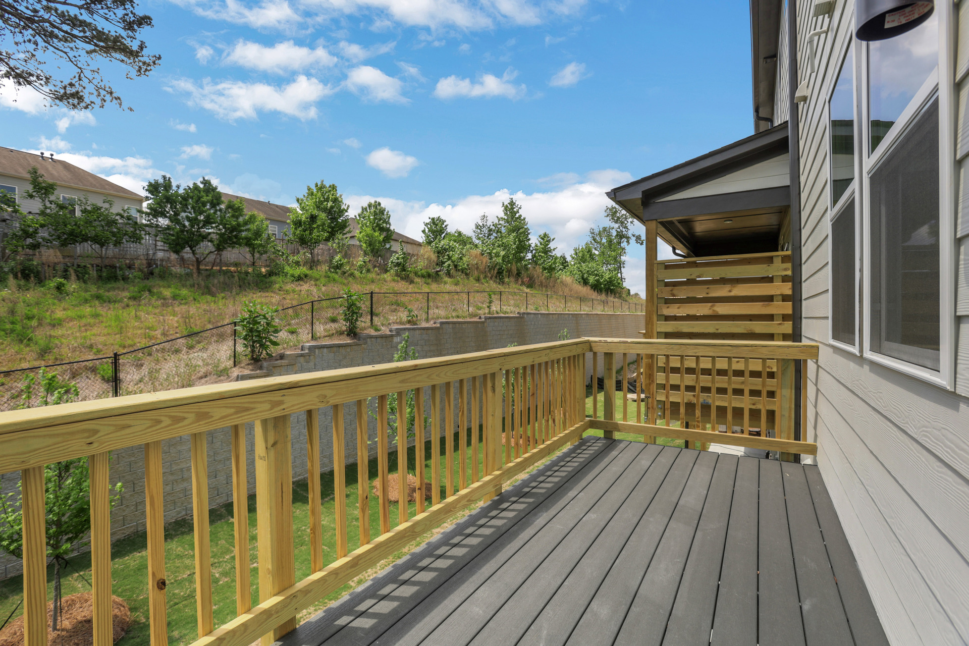 back deck overlooking backyard off of the great room
