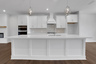 kitchen with white cabinets and quartz counters