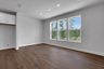 dining room with hard surface flooring and windows