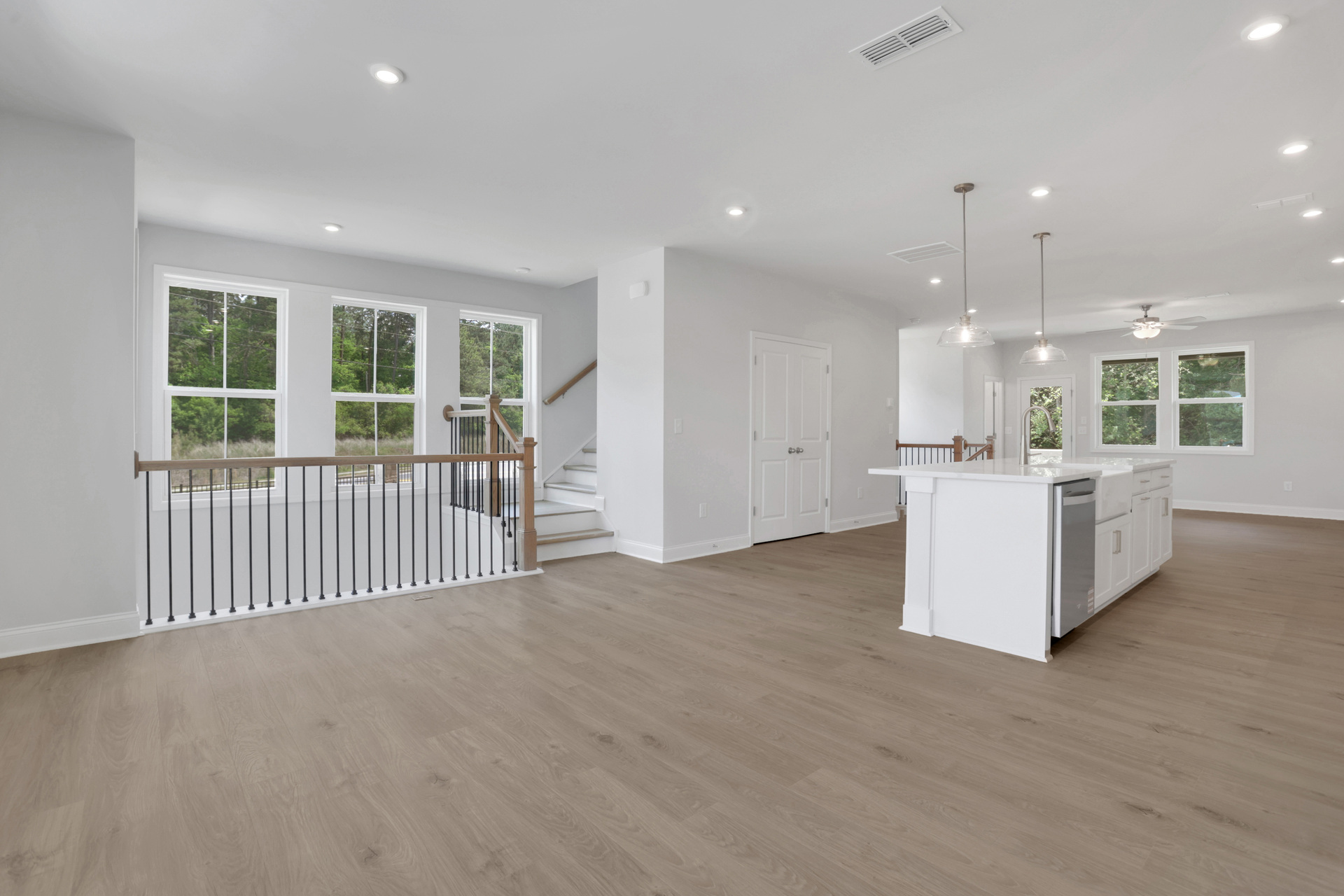 dining room with hard surface flooring and windows