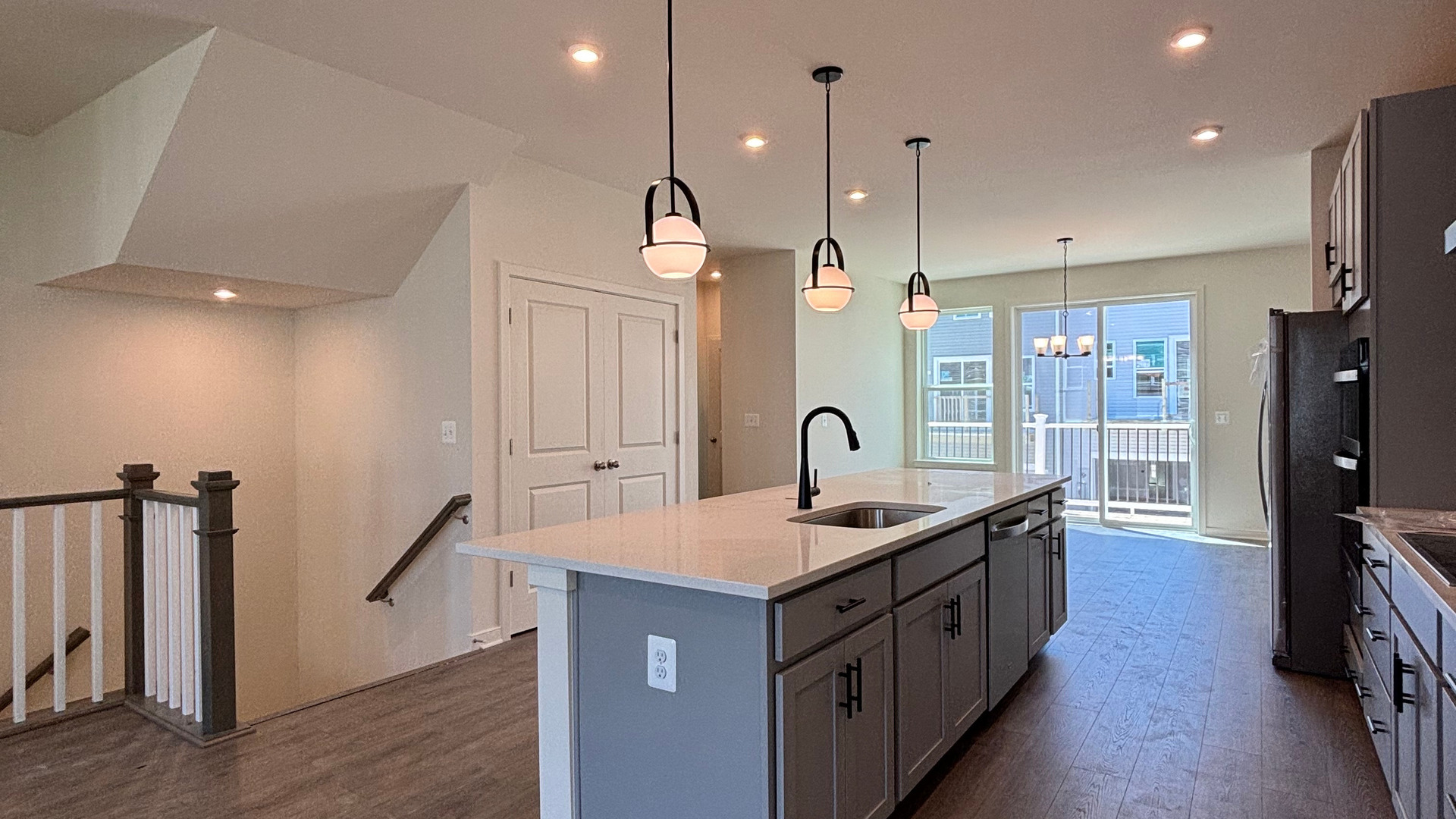 kitchen with large kitchen island and pendant lighting