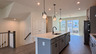 kitchen with large kitchen island and pendant lighting