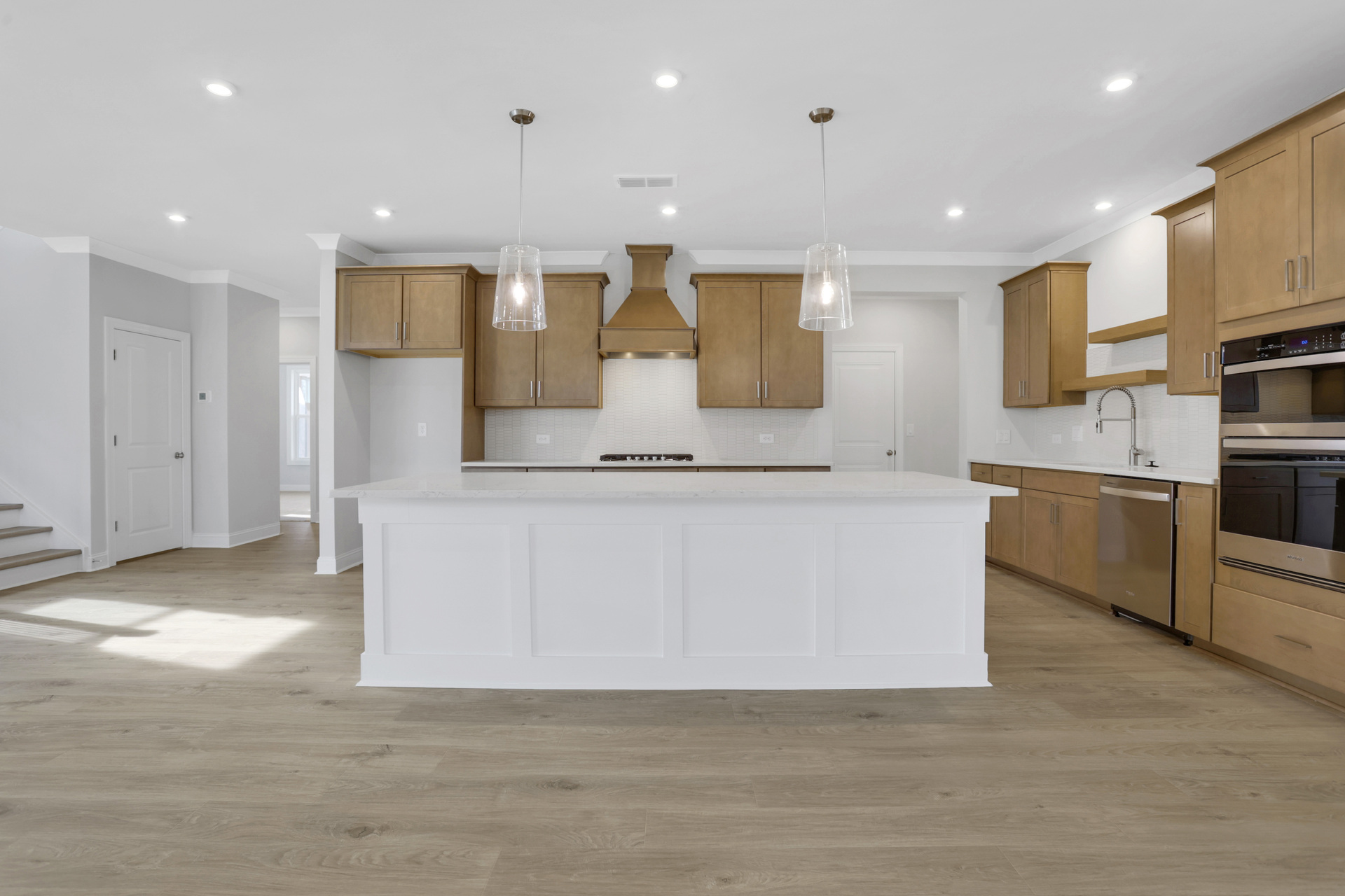 kitchen with wood cabinets and white quartz counters