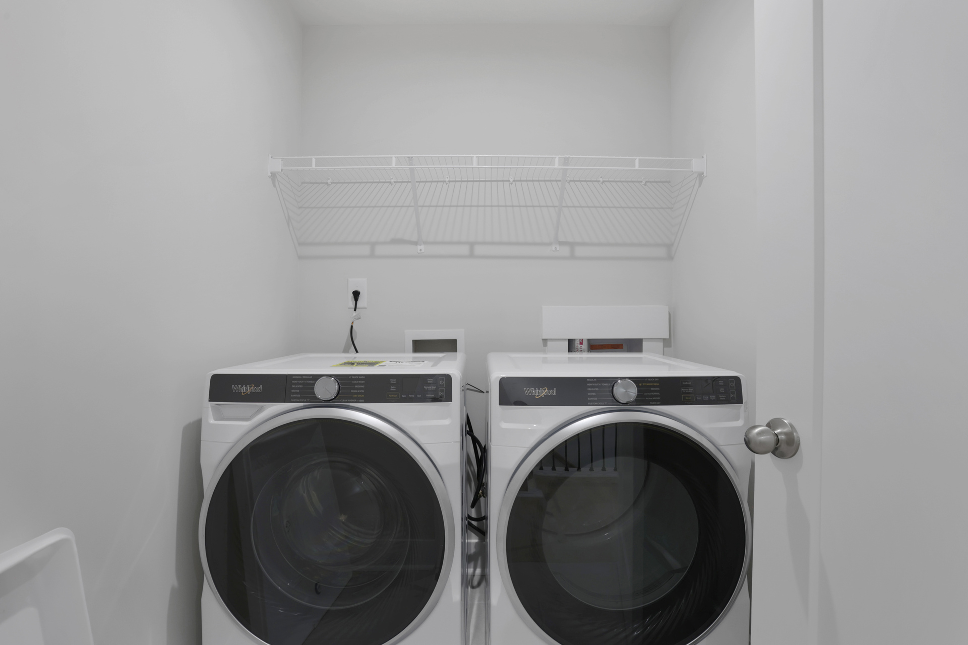 laundry room with washer and dryer