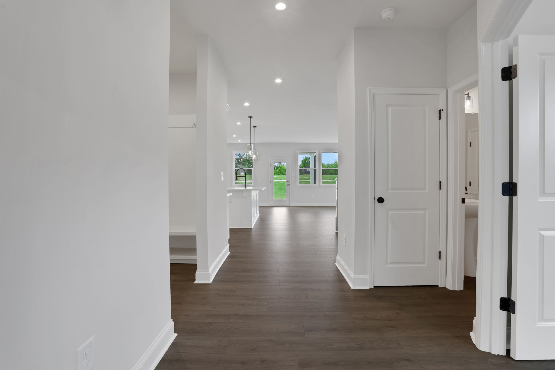foyer with hard-surface flooring and doors to study