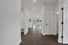 foyer with hard-surface flooring and doors to study