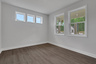 study with hard-surface flooring and windows