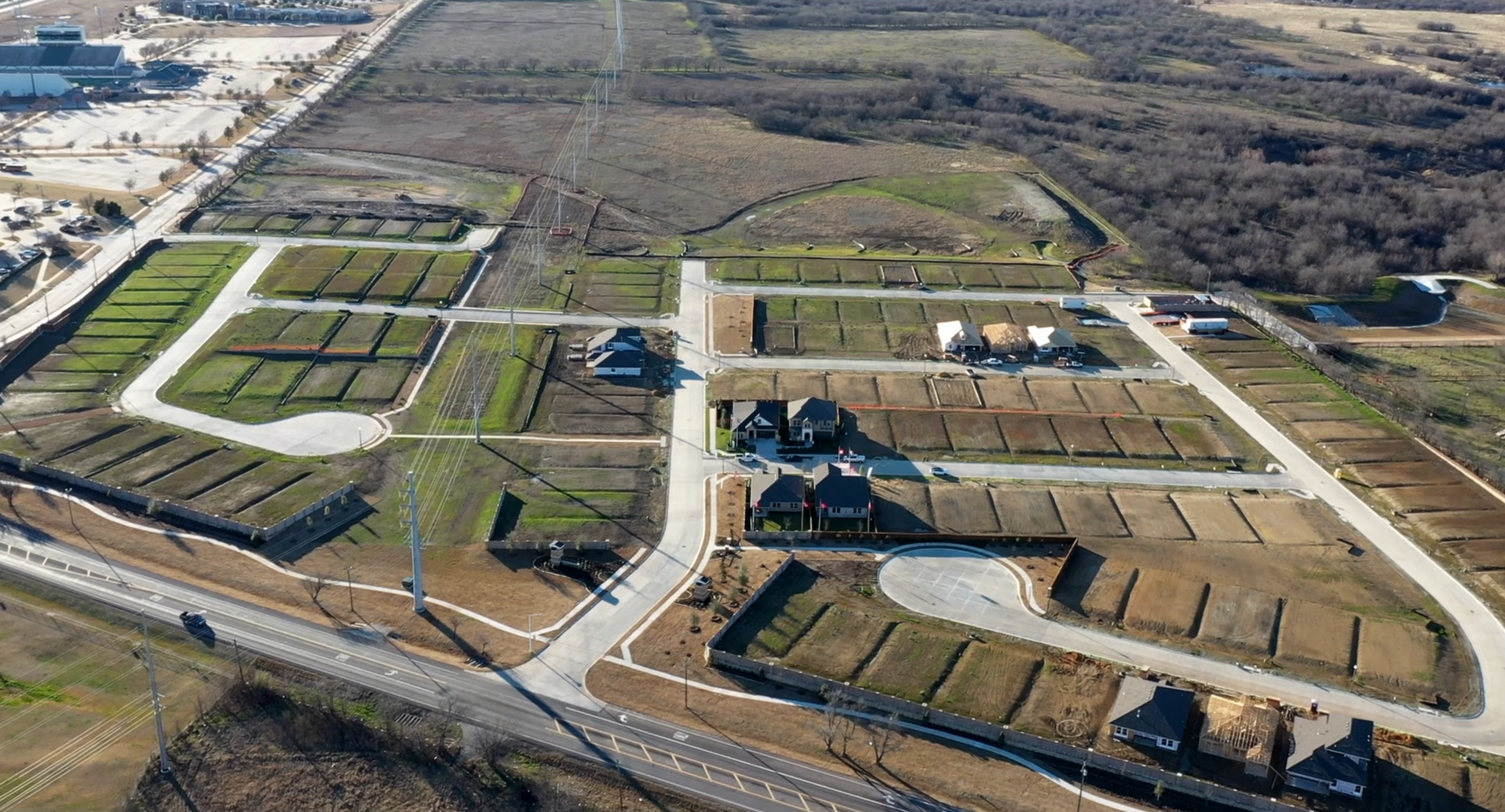 a virtual tour of a community surrounded by fields