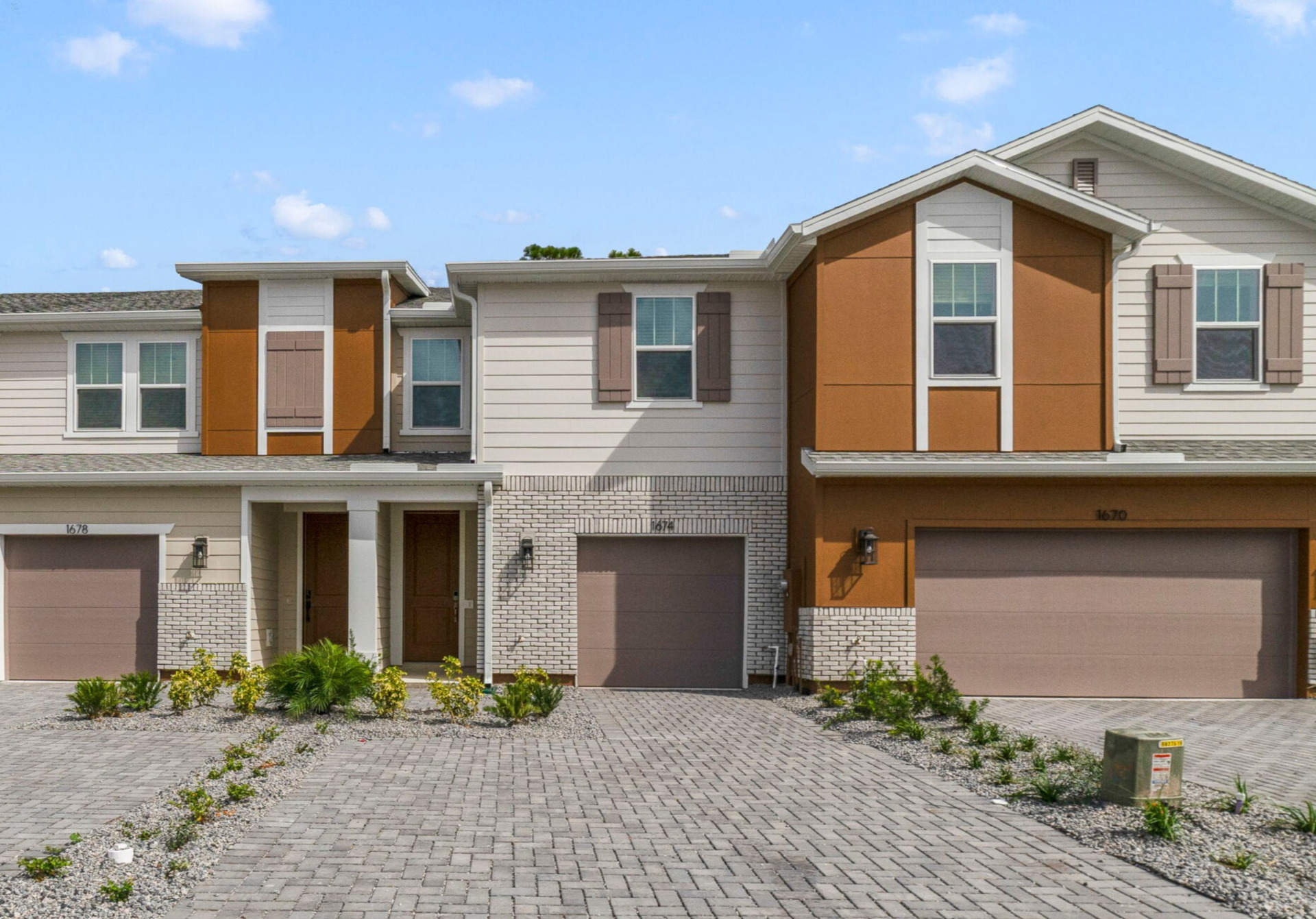 front exterior of the home, garage and front door