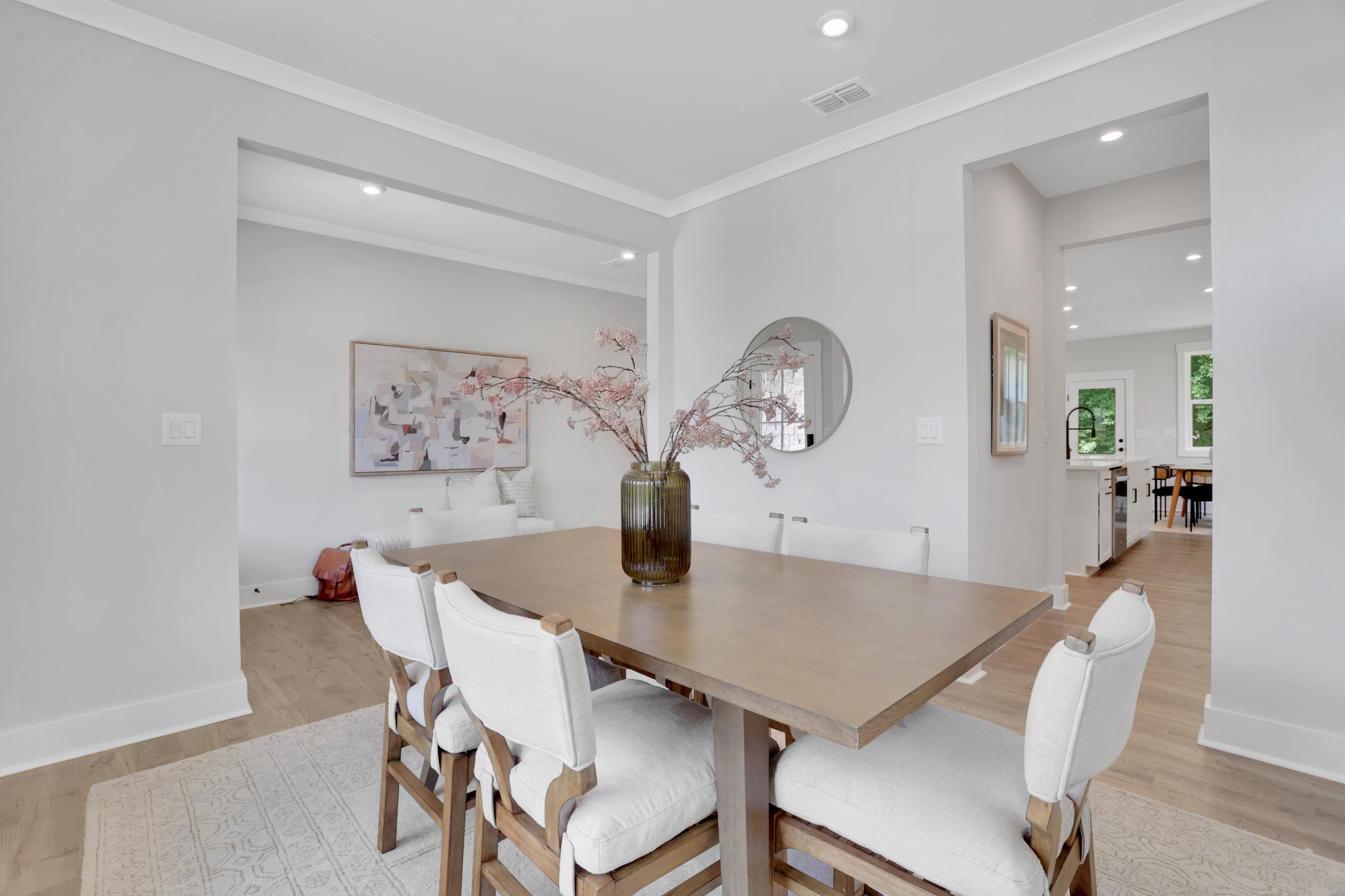 dining room with hard surface flooring and windows