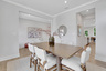 dining room with hard surface flooring and windows