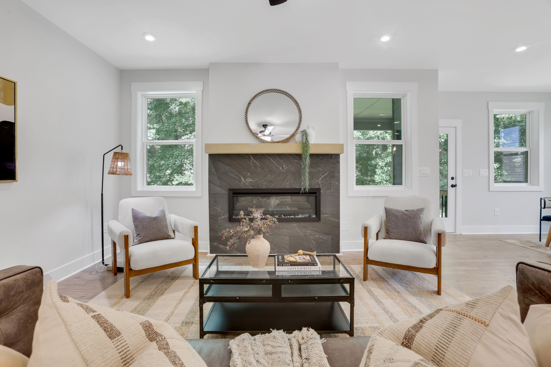 great room with electric fireplace and hard surface flooring