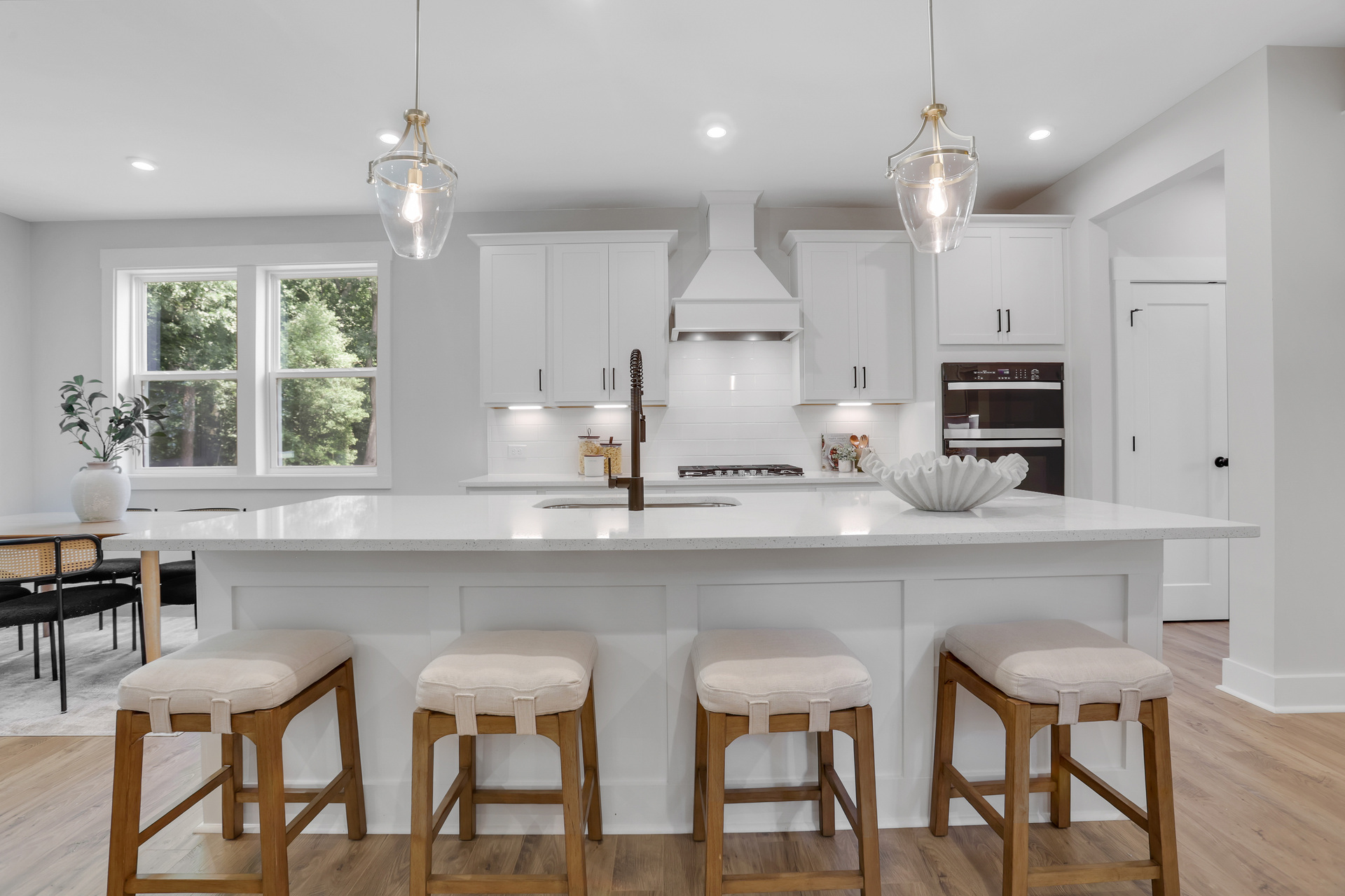 kitchen with white cabinets and quartz counters