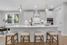 kitchen with white cabinets and quartz counters