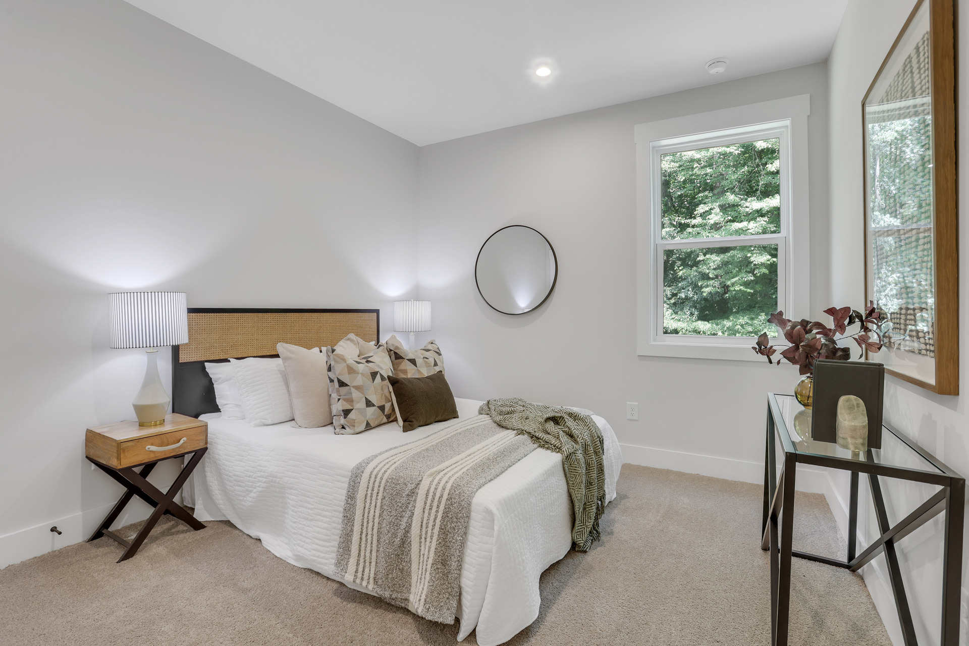 bedroom with windows and carpet