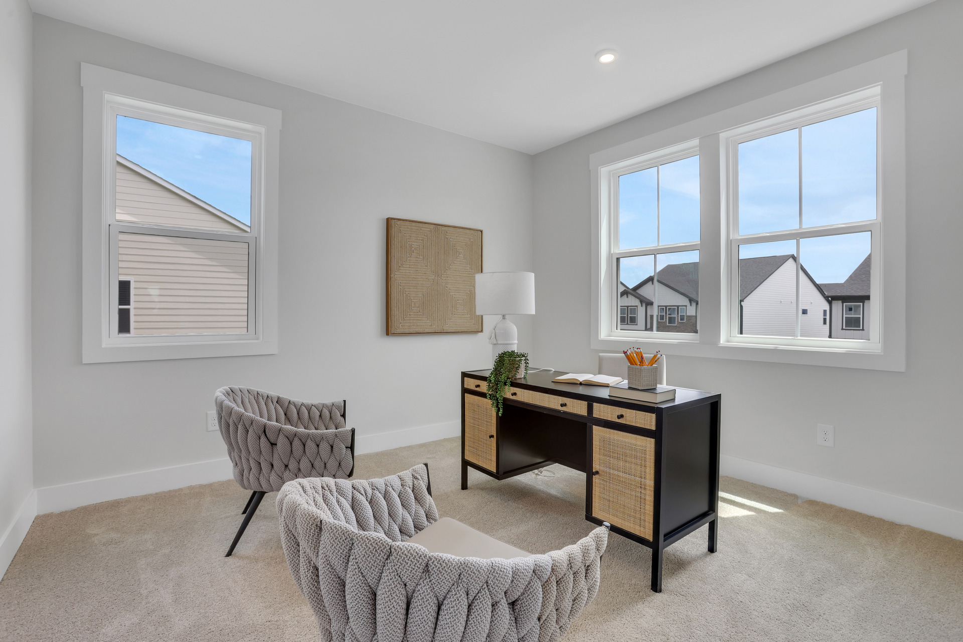bedroom with windows and carpet