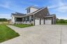 home exterior showing 3 car garage