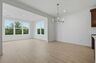 dining room with statement chandelier