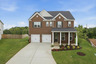 two-story home with red brick, covered porch, black roof, black shutters, and two-car garage