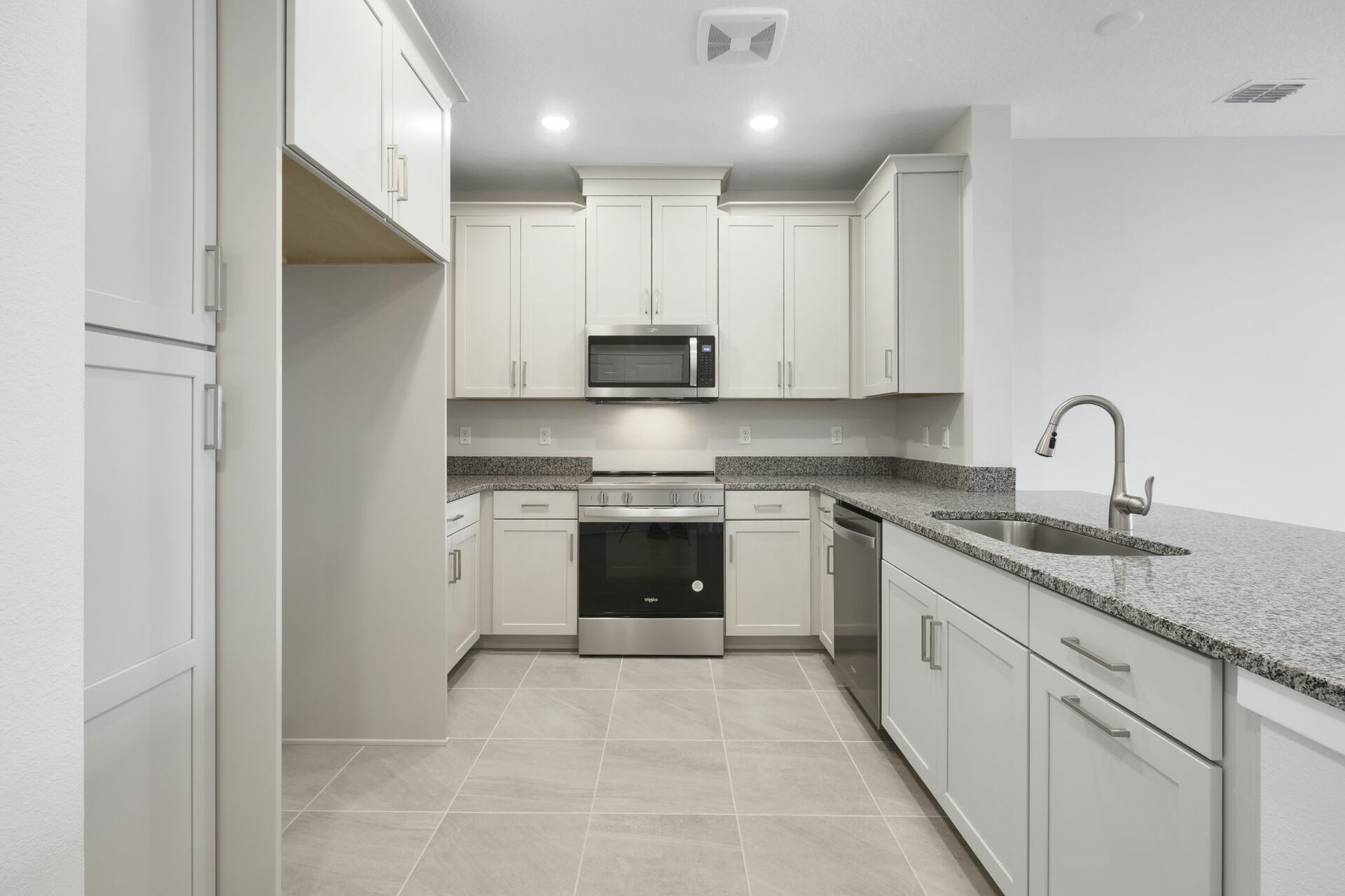 stainless steel appliances and granite countertops