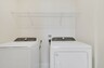 laundry closet with washer and dryer