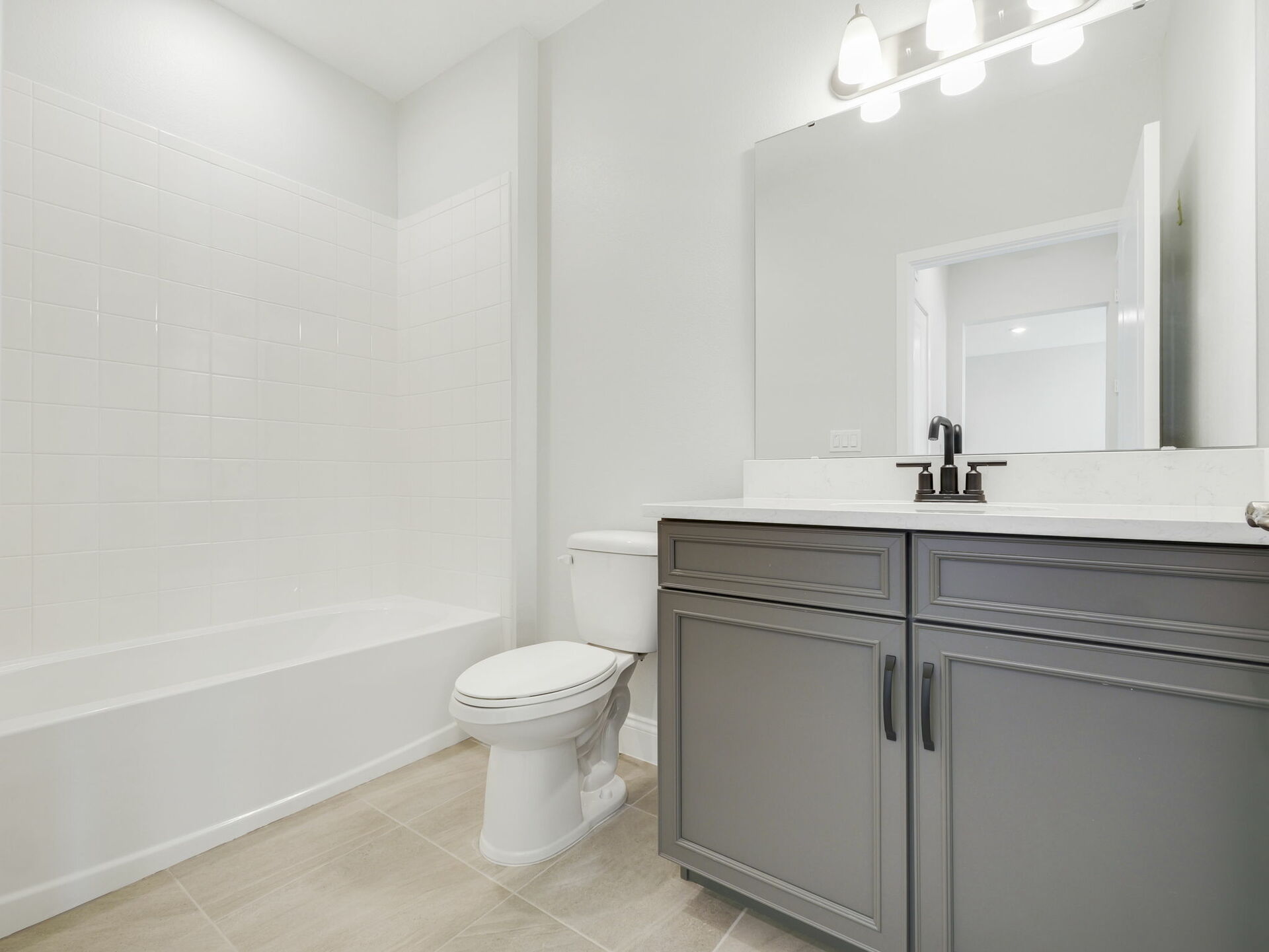 single sink vanity, water closet and shower