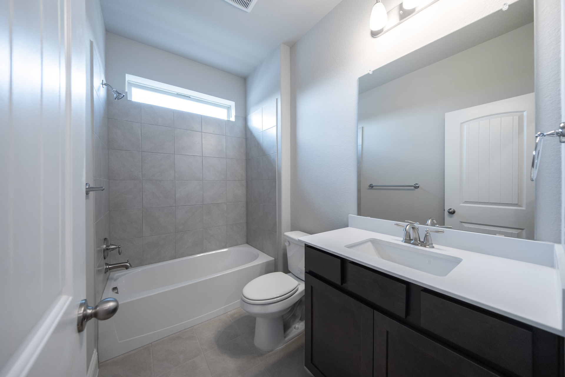 guest bathroom with soaking tub
